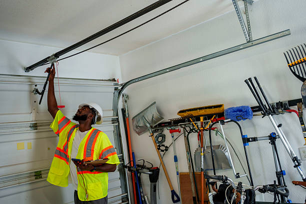 Professional Garage Door Panel Replacement technician working in Fulton, NY